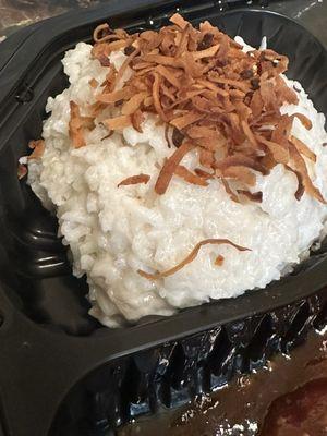 Coconut rice with a coconut cream and toasted coconut.