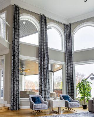 Drapery Panels help frame the windows and add height to make your space feel larger.