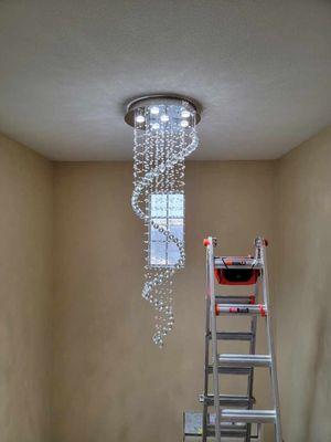 Another Chandelier was installed in a high ceiling house (28 feet ceiling).