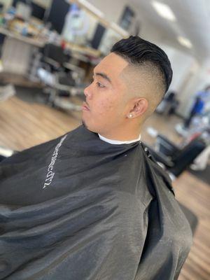 Pompadour / bald fade