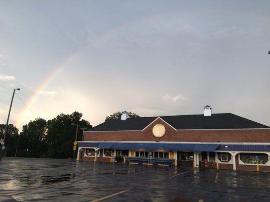 Beautiful rainbow sunset overlooking Midwood-Plaza / NoDa area. Mural paintings in the front building brings artsy vibes