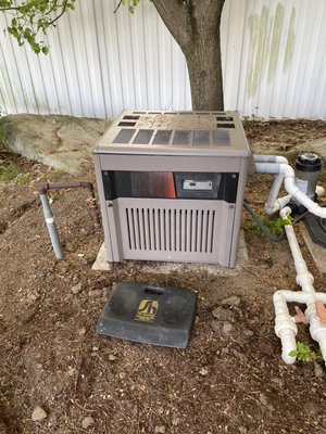 Old Hayward pool heater being changed out. (Before picture)