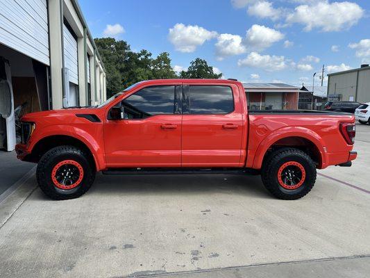 Color matched bumpers, flares, bead locks. 2023 Raptor