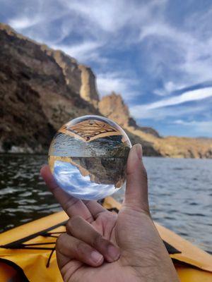 Lensball photography with riverbound sports kayak