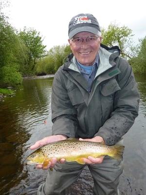 Phil with a fine brown trout from the River Nire in County Waterford, Ireland