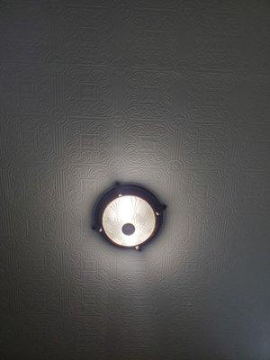 View from the hair wash areas, looking up at the ceiling. Detailing in the design on the ceiling just adds to the ambiance.