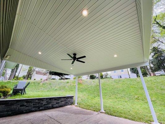 Finished roof with recessed lighting and fan