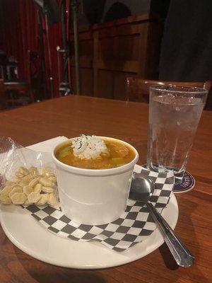 Junebug Gumbo (12oz) with a little rice on top and oyster crackers