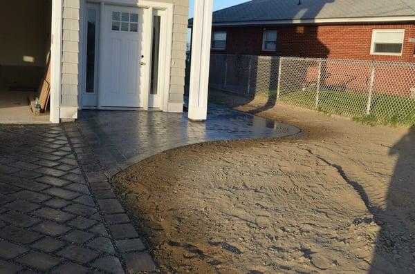 Paver driveway, extended walkway, wrap around to patio.