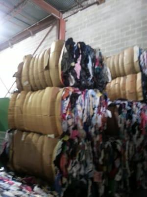 Thousand pound bales of clothing....purchased from Texans....one closet at a time.