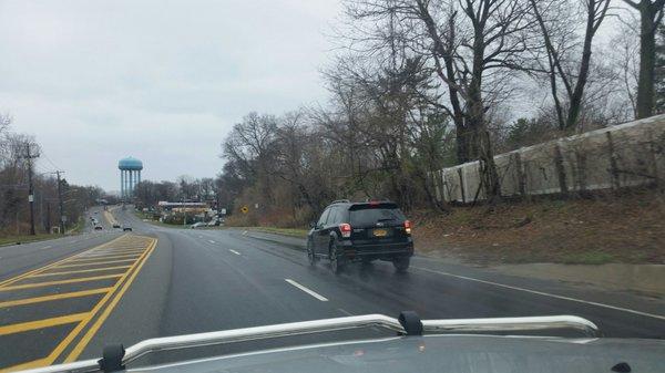 Can you see what the driver is drinking in the photos?  Driving drunk?