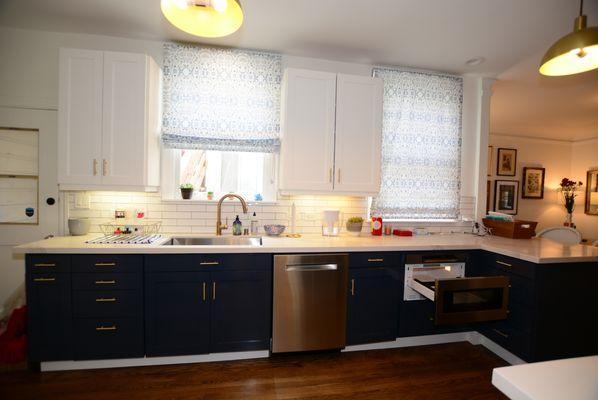 Re-paint kitchen cabinets to give your kitchen a brand new look. Best is a microwave in a shelf.