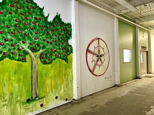 Artwork in the hallway outside the entrance near forest city brewing