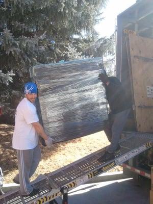 Eugene and James packing a semi trailer