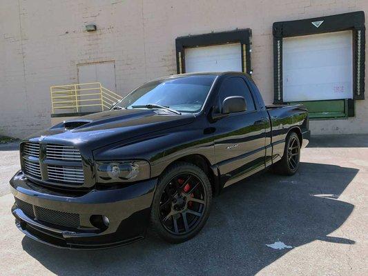 2005 Dodge Ram SRT-10. Same 505hp motor as Dodge Viper. New build by us, new cam, headers, cold air intake, etc. Lowered. Mean!