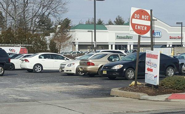 They do need to work on sign placement. You can't put an entrance sign by the exit to the parking lot.