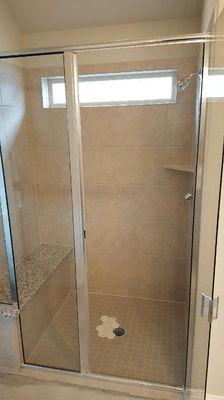 Before pic of builders grade shower