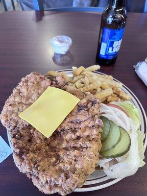 Breaded tenderloin with fries.