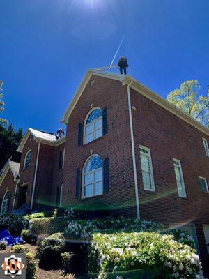 Roof being installed on a beautiful day in Greystone, Alabama!