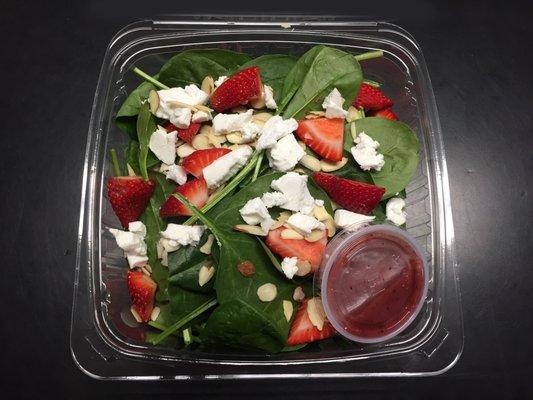 Our Strawberry Baby Spinach Salad with Sliced Almonds, Crumbled Goat Cheese, & a Lite Raspberry/Walnut Vinaigrette