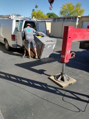 Richard from heat Slayer hvac is installing brand new air conditioner on our condo roof. Great job!