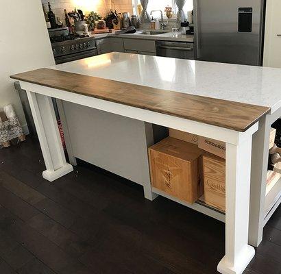 An elegant eating extension for an apartment kitchen.