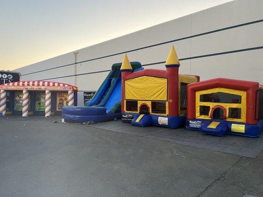 Carnival games, large slide, and jumpers