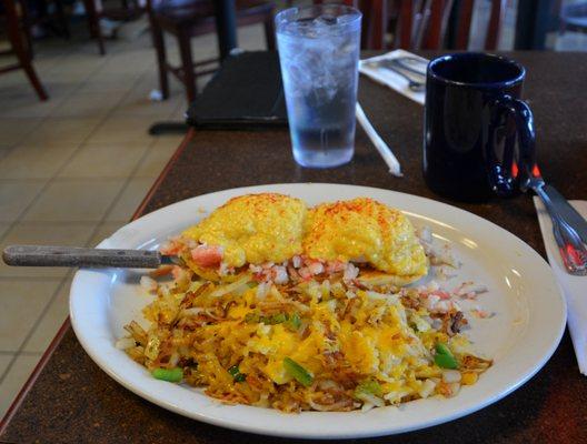 Crab Benedict with Hash Browns made with Peppers, Onion and Cheese