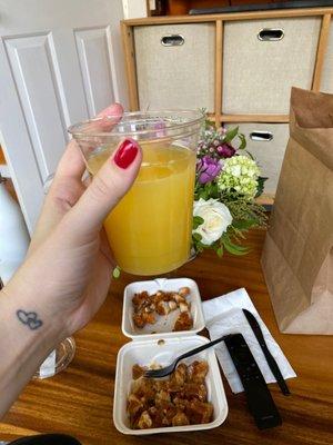 Massive delivery mimosa with waffle and spicy Spicy Breaded Chicken Bites below. It was much prettier before i sliced it all up.