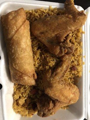 Fried rice, wings and shrimp roll.