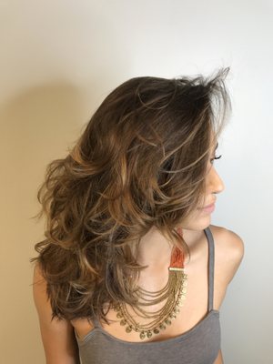 Glamorous color cut and style on this beauty!