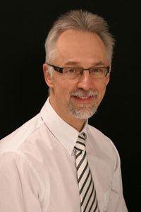 Dr. Raymond Voller, Pittsburgh's trusted cosmetic dentist for over 35 years.