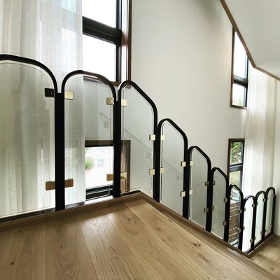 Glass & iron rails with brass clips