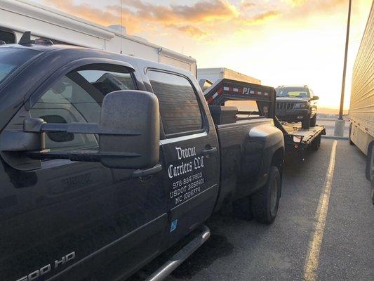 Truck shipping a customers car.