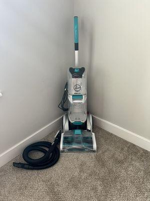 Hoover smart wash with upholstery cleaning attachment.