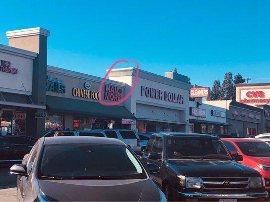 Storefront, parking lot, shopping center