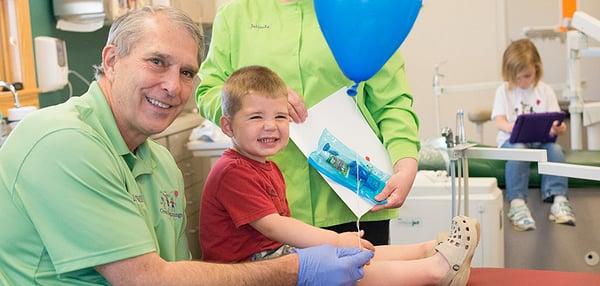 To celebrate your child's 1st visit, they will leave with a picture of them with their new dentist as well as a t-shirt and balloon!