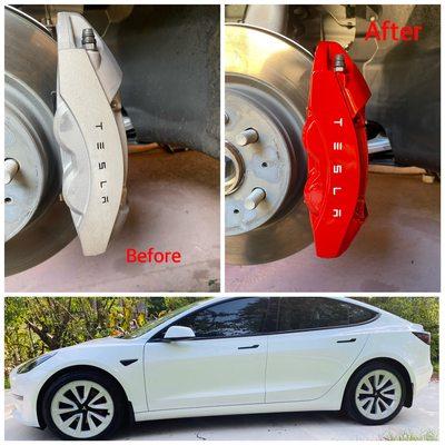 Red calipers painted on tesla model 3