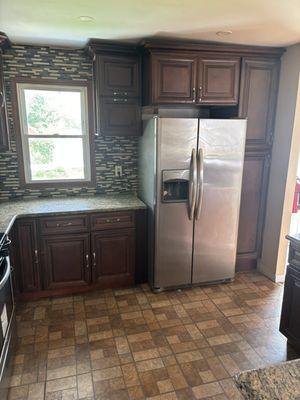 Deep cleaning kitchen ,tile, and refrigerator