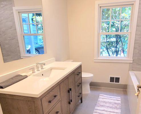 Bathroom renovation project transformed an outdated space into a modern, stylish, and functional retreat. This project included a complete