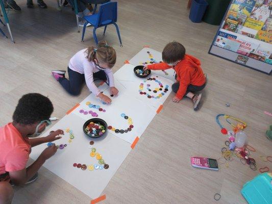 Our curriculum includes practicing social emotion skills like moving through stations and working cooperatively.