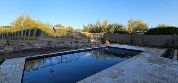 Finished, a very nice backyard with desert plants, rocks, planter, Turf and Golf.