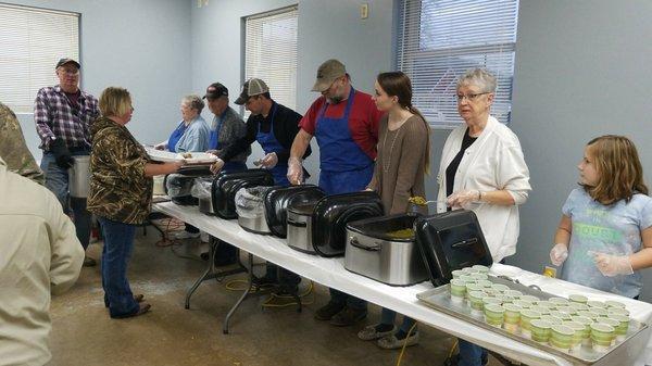 Serving line at Community Thanksgiving Dinner.