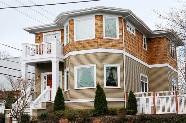 Queen Anne Exterior - After (Restored and stained shingles and painted siding and trim)