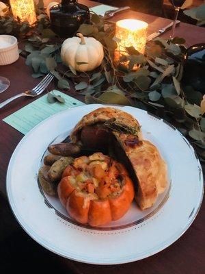 Beef Wellington, fingerling potatoes and a mini pumpkin filled with delicious root veggies and CHEESE! So good!