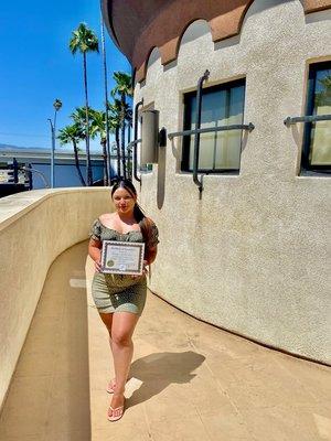 Reina with her certification in LA