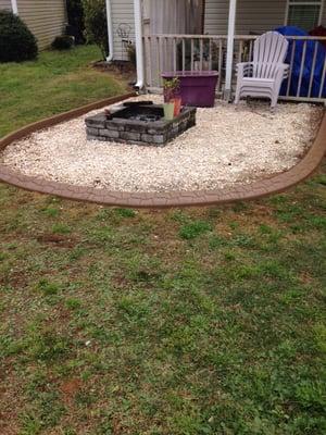 Landscape curbing with flagstone text recently installed