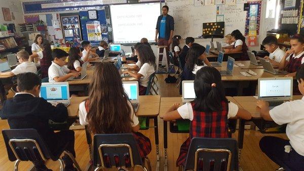 Mr. Luis and Grade 3 during their weekly coding lesson (CodeRev Kids - Santa Monica).