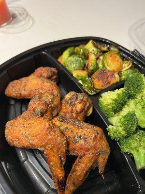 Lemon pepper wings, broccoli & Sautéed Asparagus