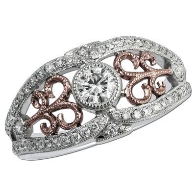 Beautiful combination of 14 karat white gold and rose gold with a dazzling round diamond bezel set in center